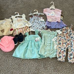 Brand new outfits with tags. All 12 month items!